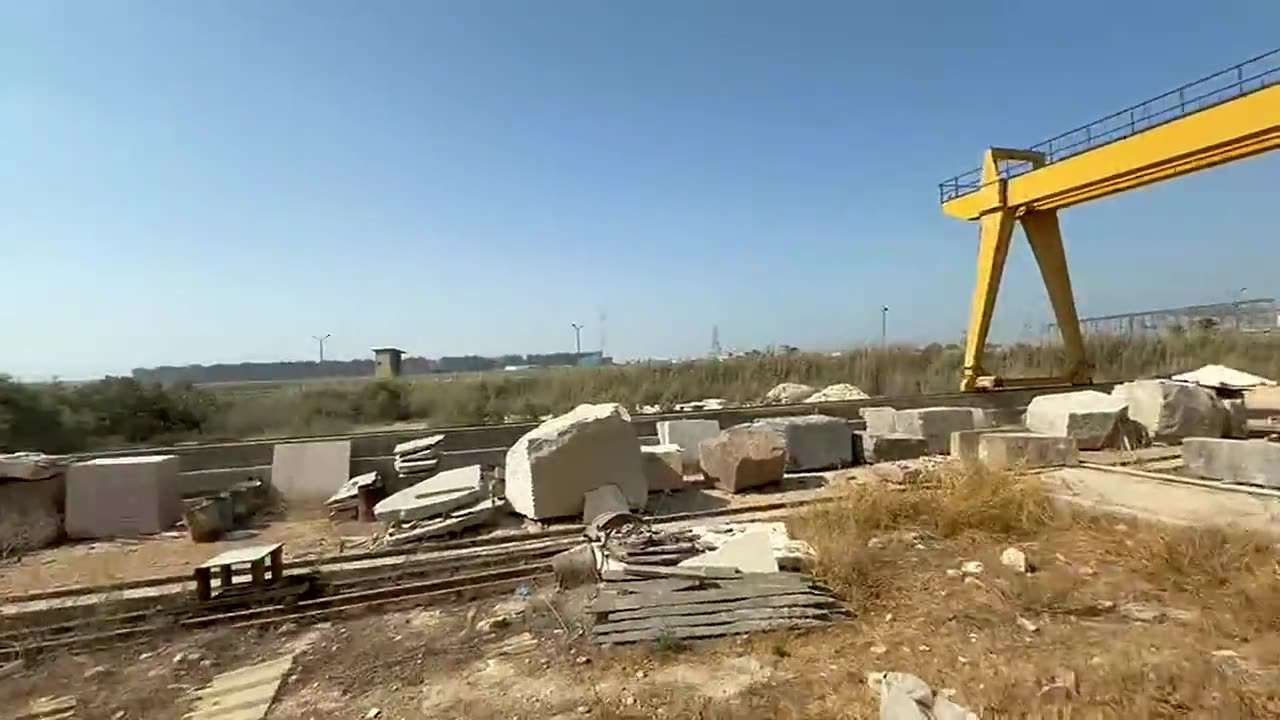 The block yard and gantry crane — video still from the Wesha Stones factory in Alexandria