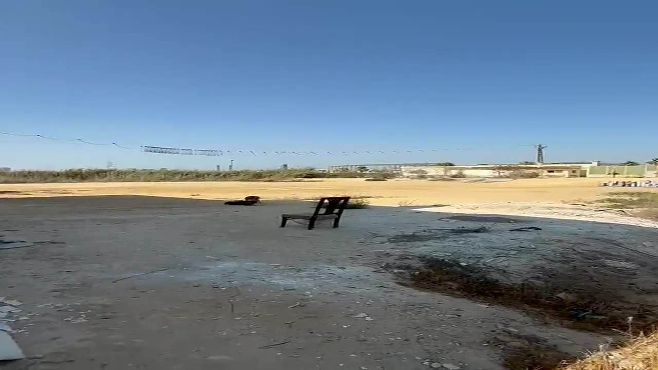 The open ground beside the plant — video still from the Wesha Stones factory in Alexandria